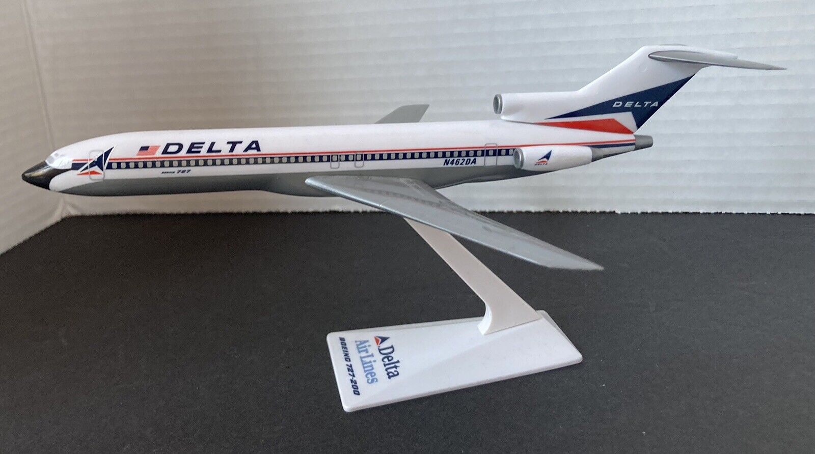 vintage 1980's Delta Air Lines 727-200 model on stand