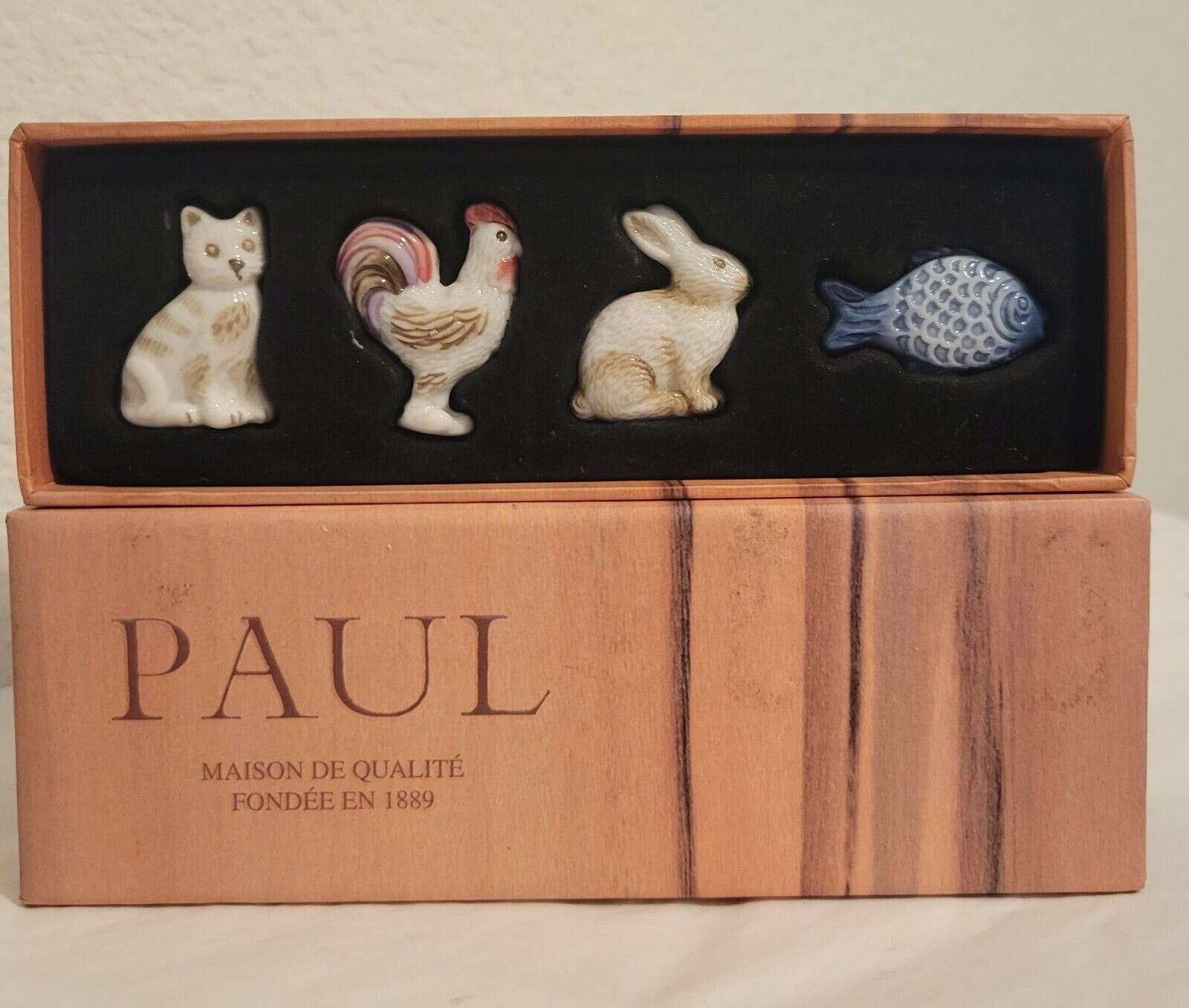 Set of 4 paul maison de qualite fondee en 1889 miniature figurines 