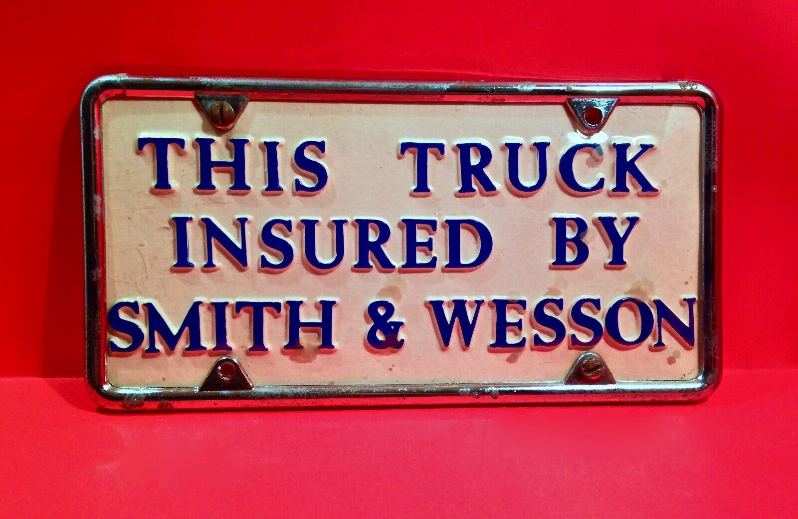 Vintage 1960's 70's This Truck  Insured By Smith & Wesson License Plate W/ Frame