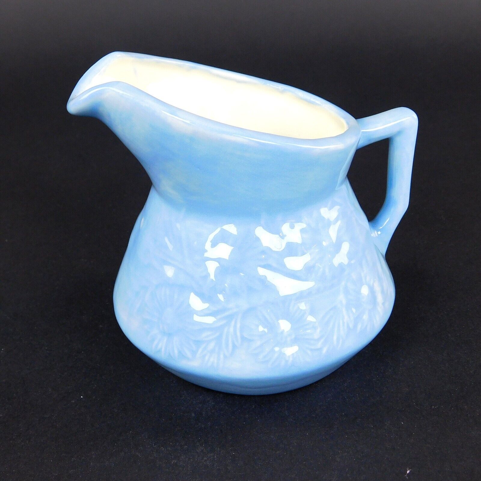 Vintage ceramic Pitcher 1 Pint Light Blue Raised Daisies 1971 Signed By Bea 1971