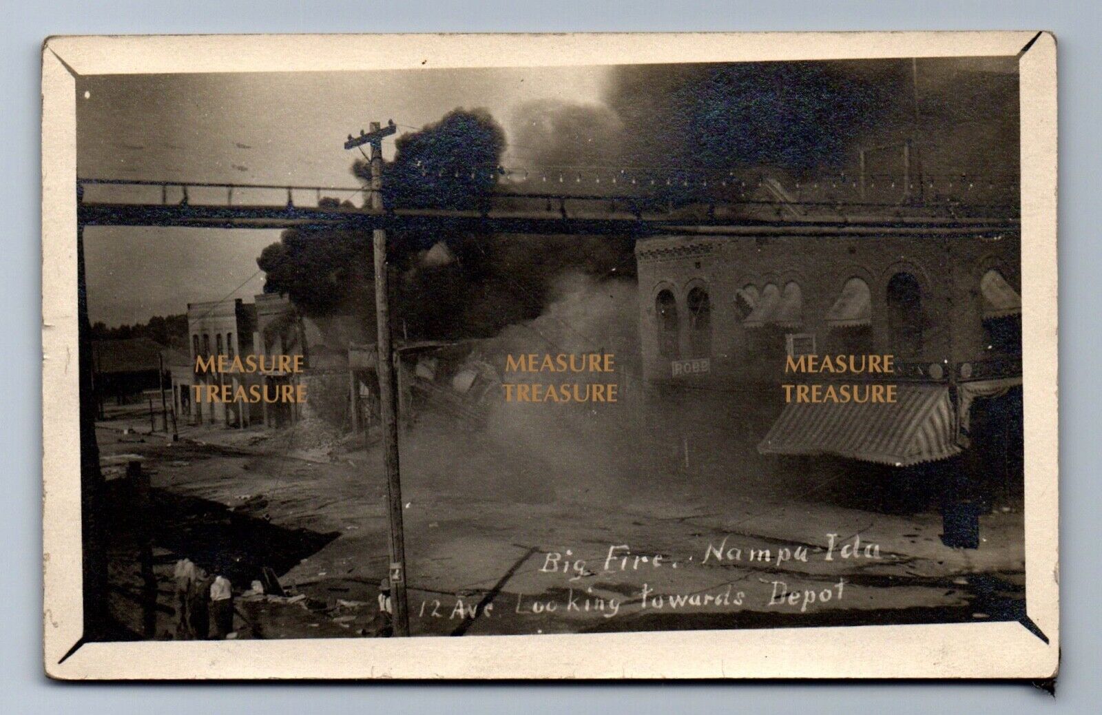 1909 RPPC GREAT FIRE NAMPA ID, 12 AVE, DEPOT, BANK, ROBB, ONLOOKERS Postcard PS