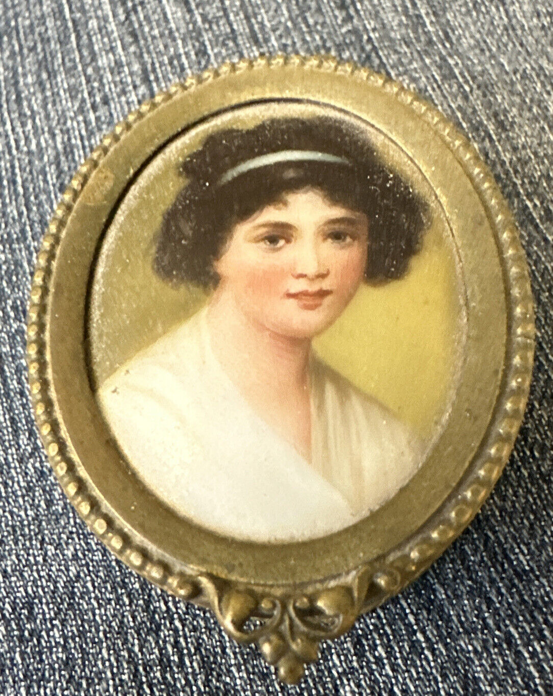 Antique Trinket Brass Miniature Lithograph? dark haired young woman 2” painted?