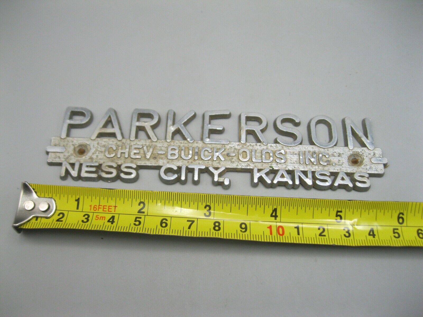 Vintage Metal Dealer / Dealership Badge / Emblem Parkerson Chev-Buick Ness City