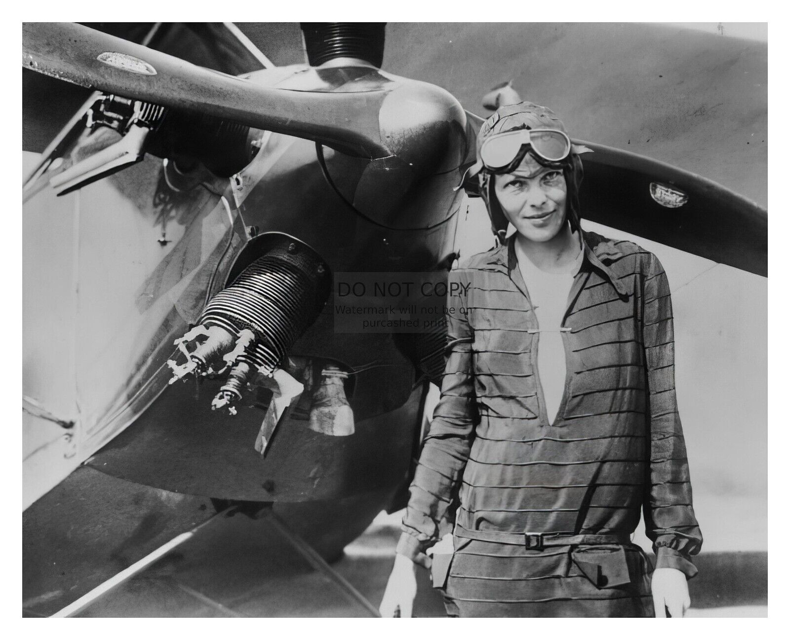 AMELIA EARHART AMERICAN AVIATRIX PILOT POSING WITH PLANE 8X10 PHOTO