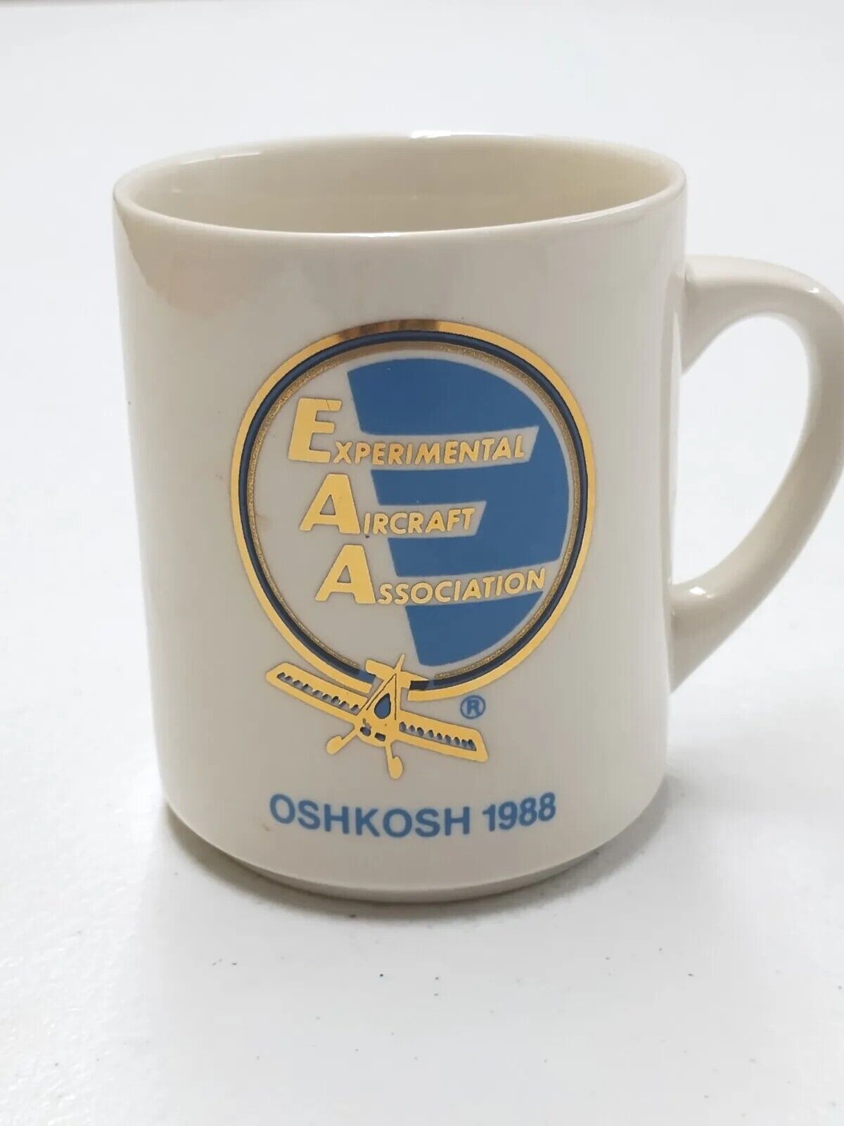 Experimental Aircraft Association EAA Oshkosh 1988 White Coffee Cup Mug Gold Vtg