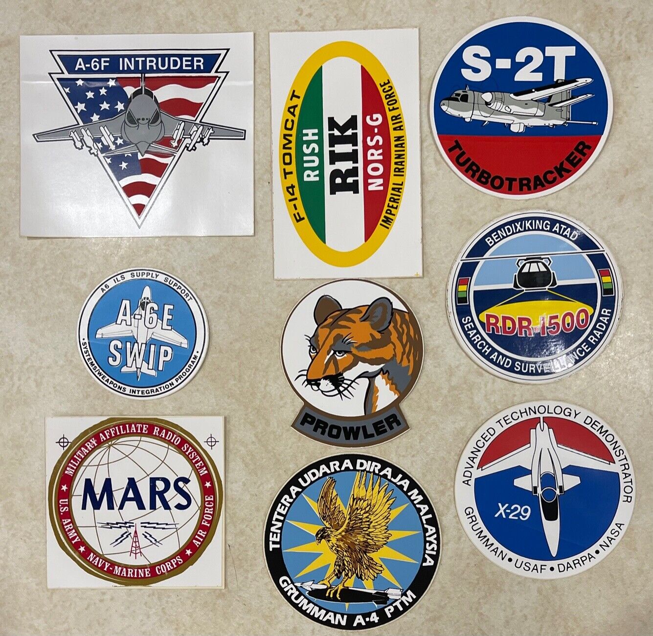 GRUMMAN & OTHER MILITARY RELATED AIRCRAFT PLUS STICKERS / DECALS - 9 pc  LOT A2