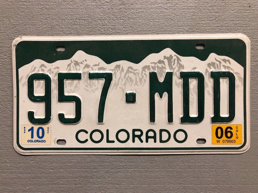 COLORADO ROCKY MOUNTAINS WHITE LICENSE PLATE RANDOM LETTERS/NUMBERS