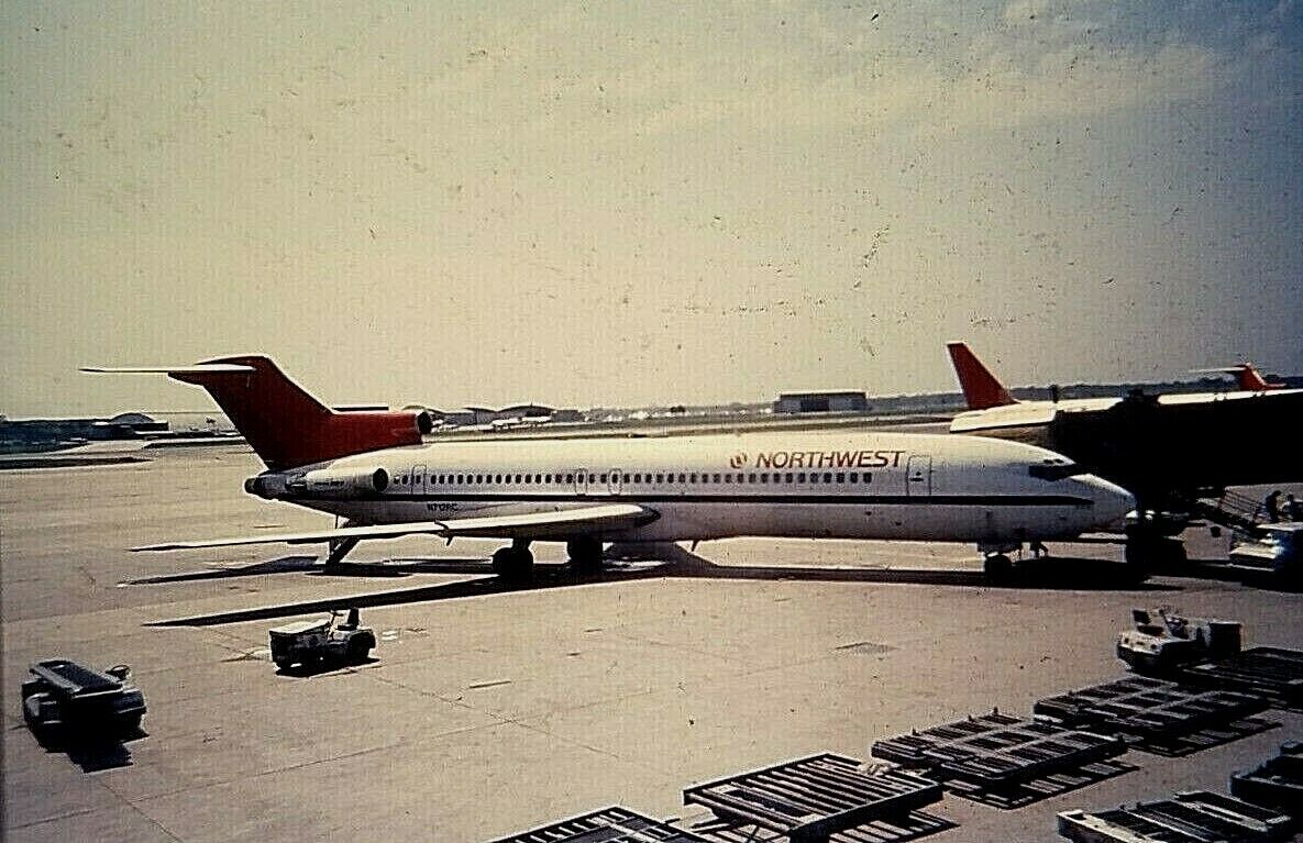 VB05 ORIGINAL KODACHROME 1960s 35MM SLIDE NORTHWEST AIRLINES JET ON THE TARMAC