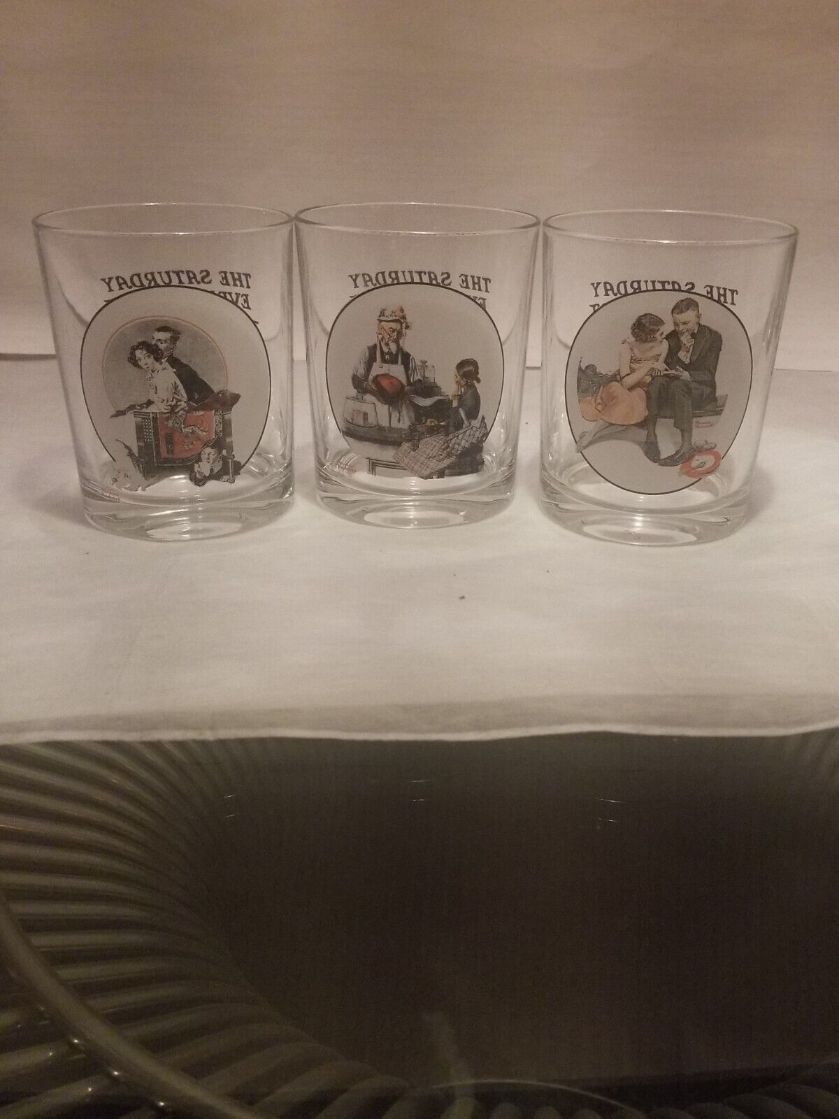 2 Sets Of Norman Rockwell glasses