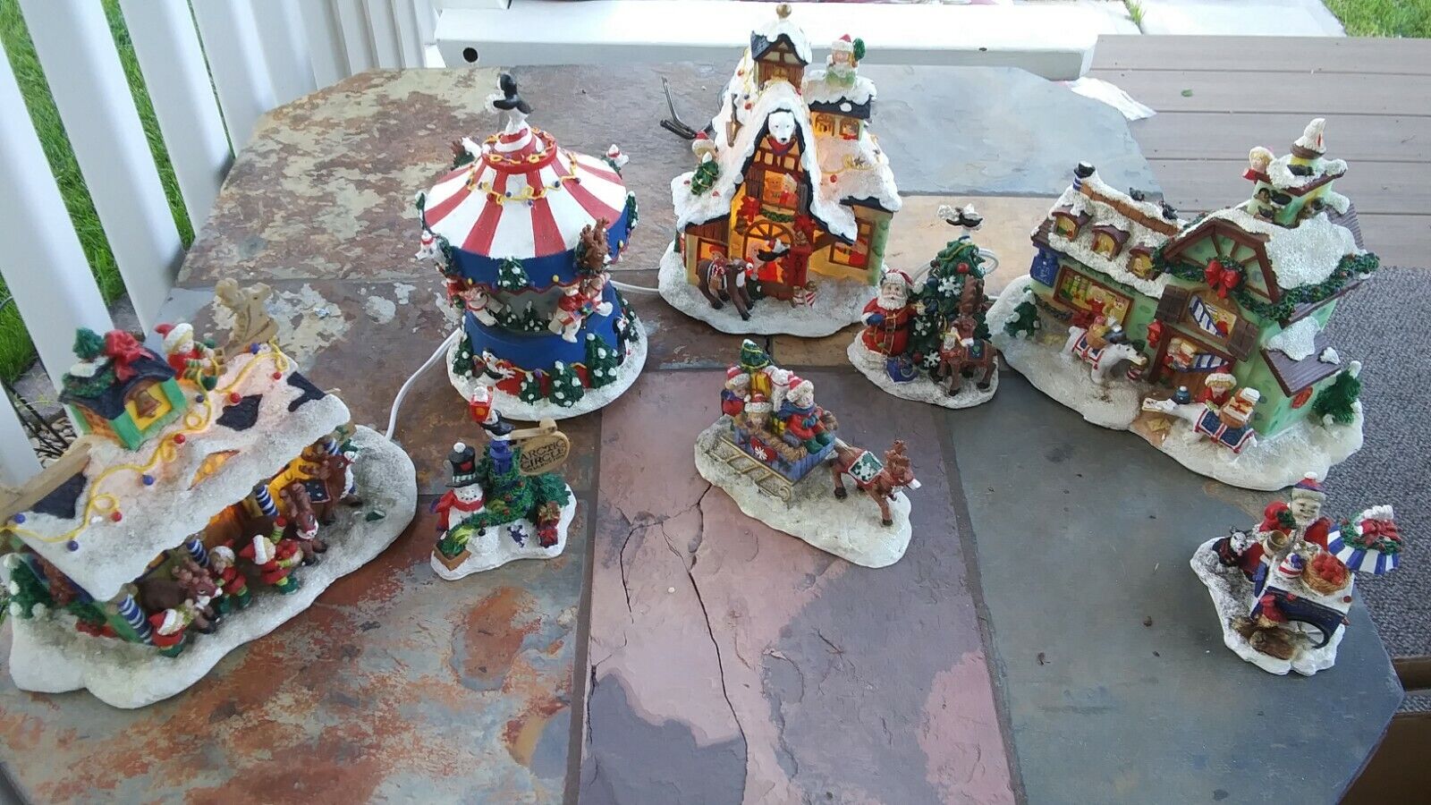 8 pc Arctic Circle Christmas Village Buildings, carousel and figures Very Rare