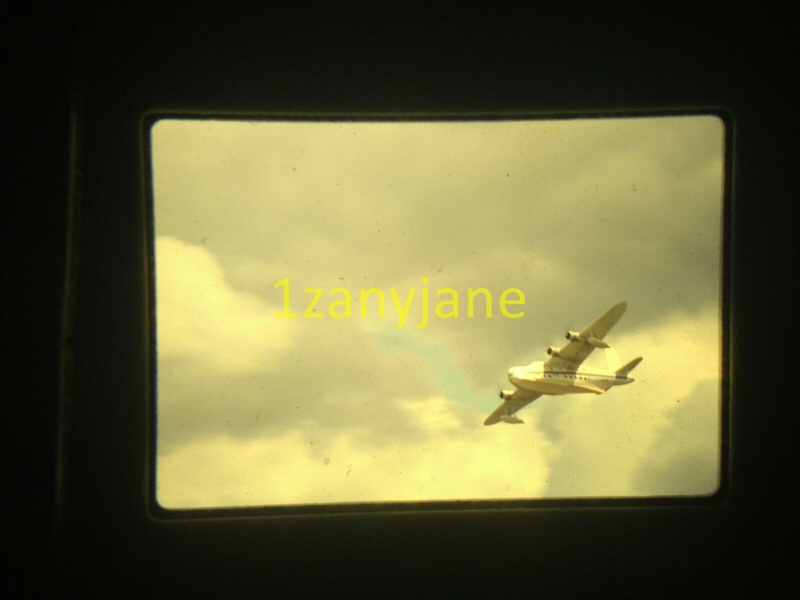 3G15 VINTAGE Photo 35mm Slide UNDERSIDE OF FIGHTER JET FROM GROUND CLOUDY SKIES