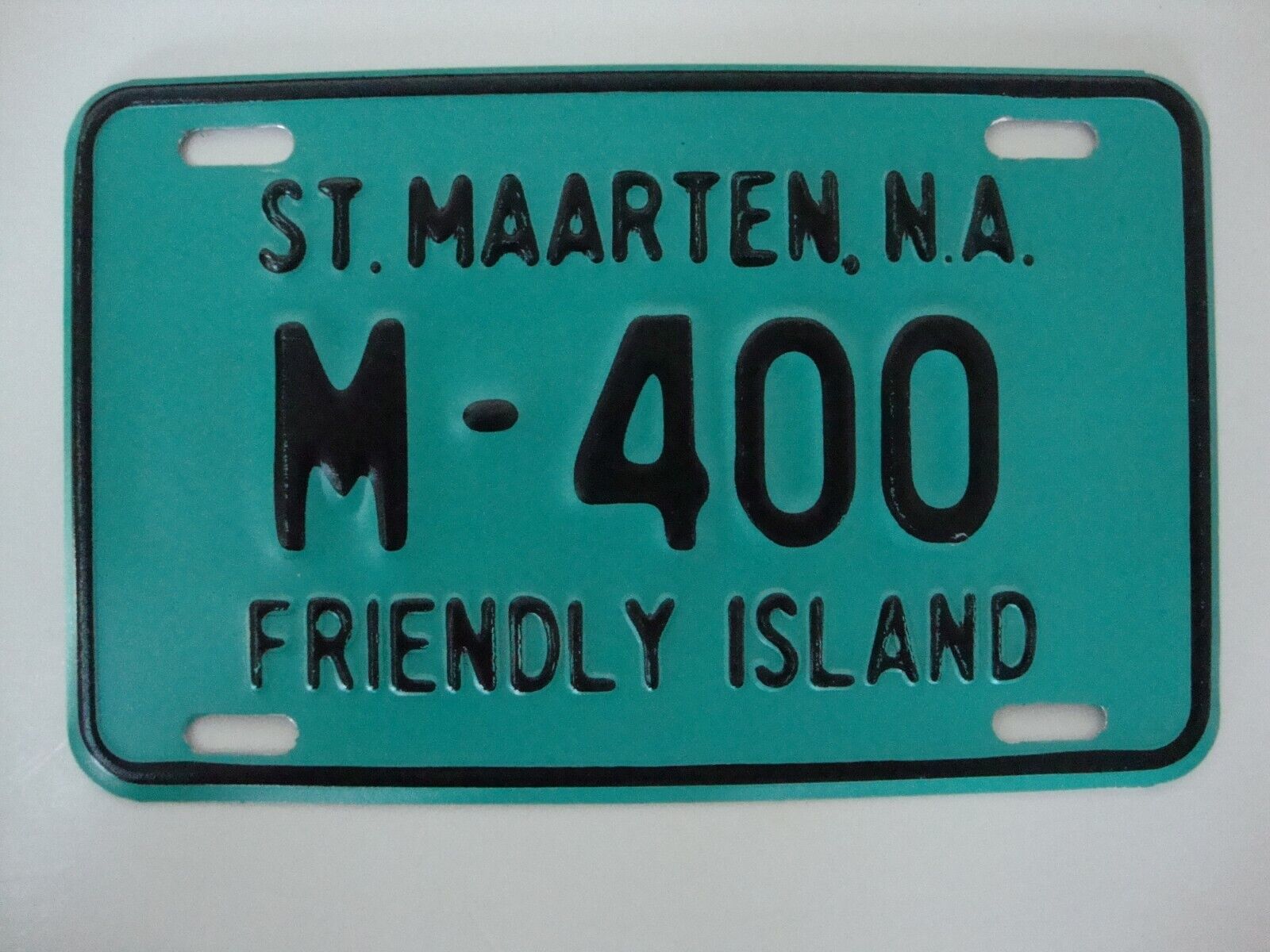 NOS St. Maarten, N.A. The Friendly Island motorcycle license plate M-400 unused