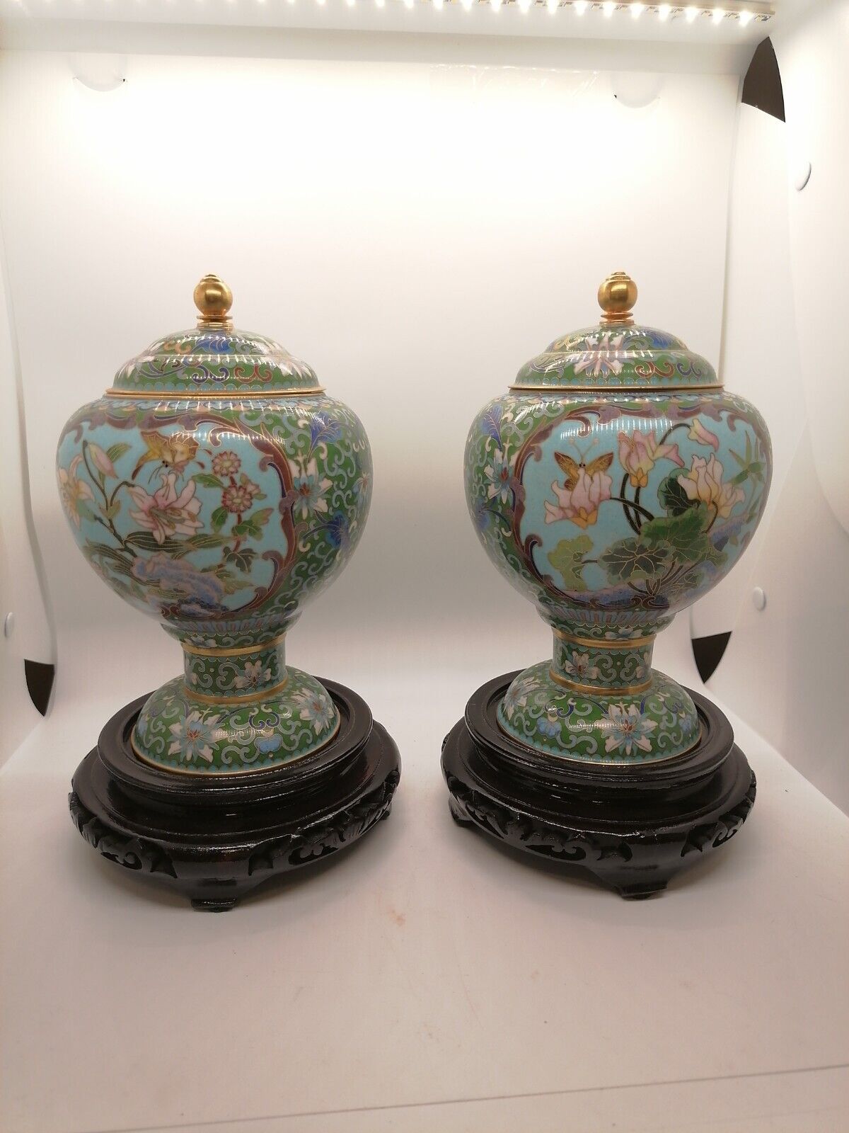 A pair of Chinese Cloisonne Brass & Enamel Red Floral Jar with Lid & Wooden base