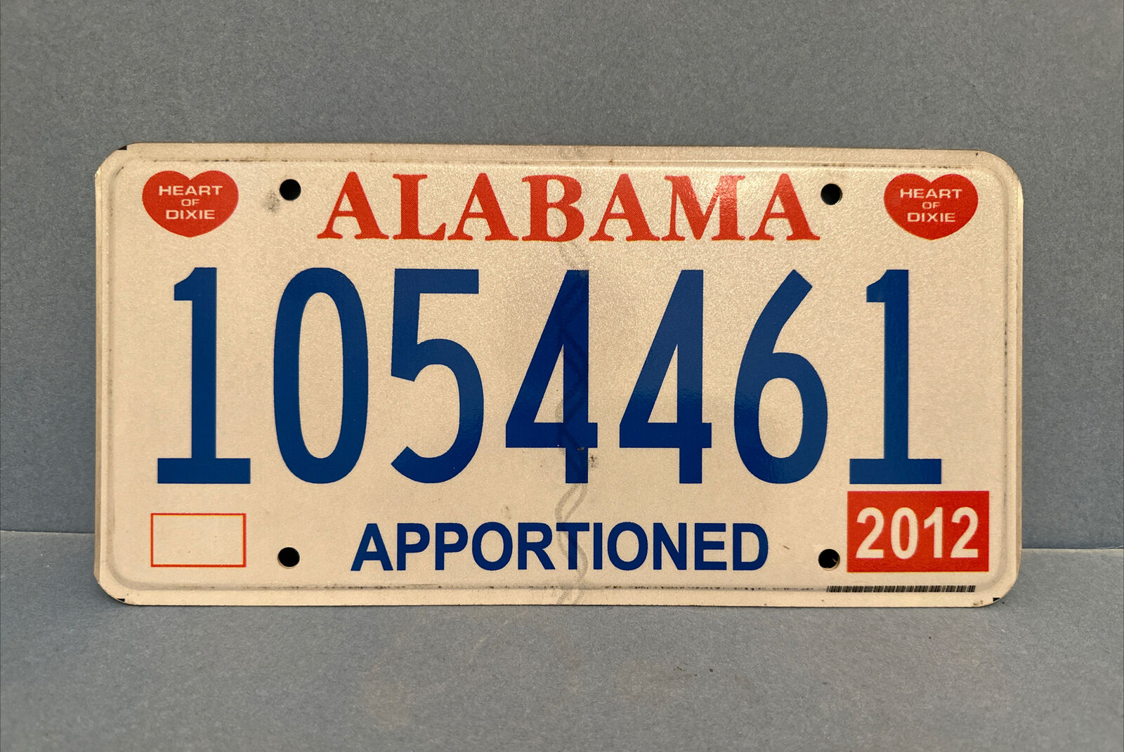 1054461 ~ 2012 Alabama APPORTIONED License Plate, BLUE LETTERS
