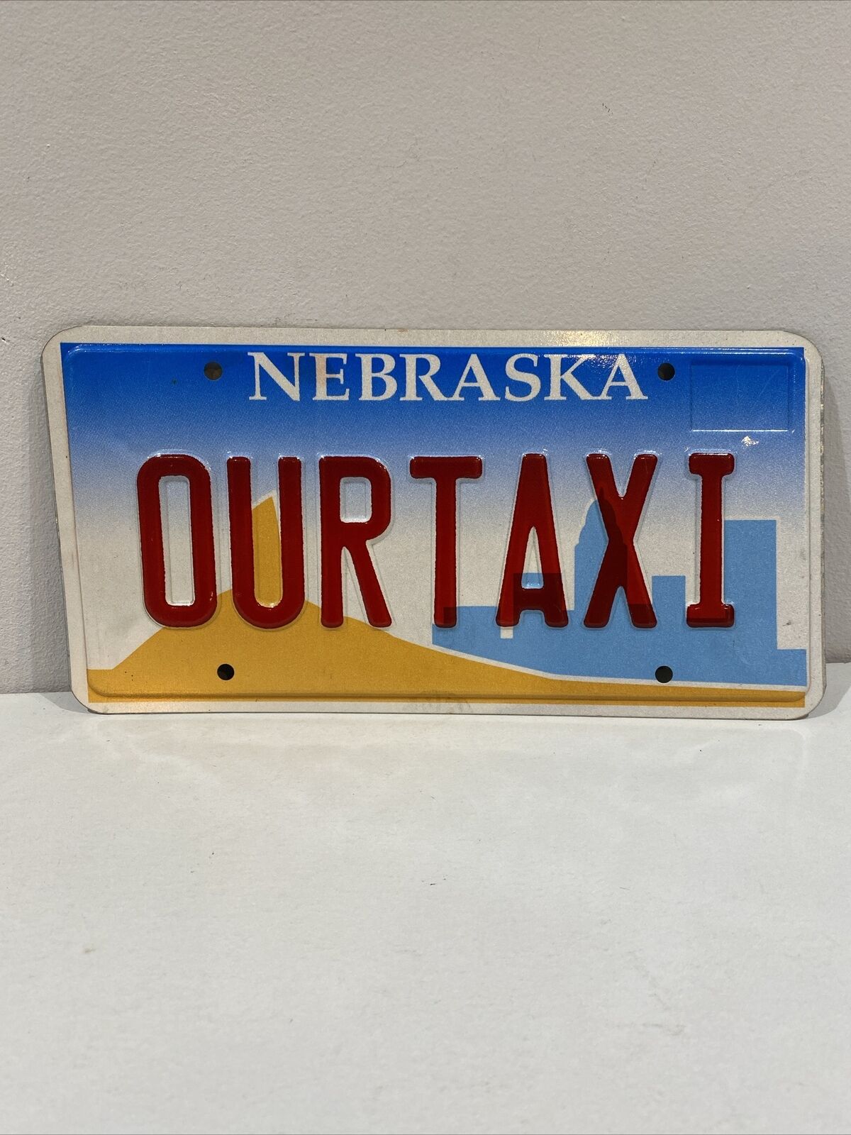 Vintage 2000 Nebraska Vanity License Plate Tag Retired Authentic Metal OUR TAXI