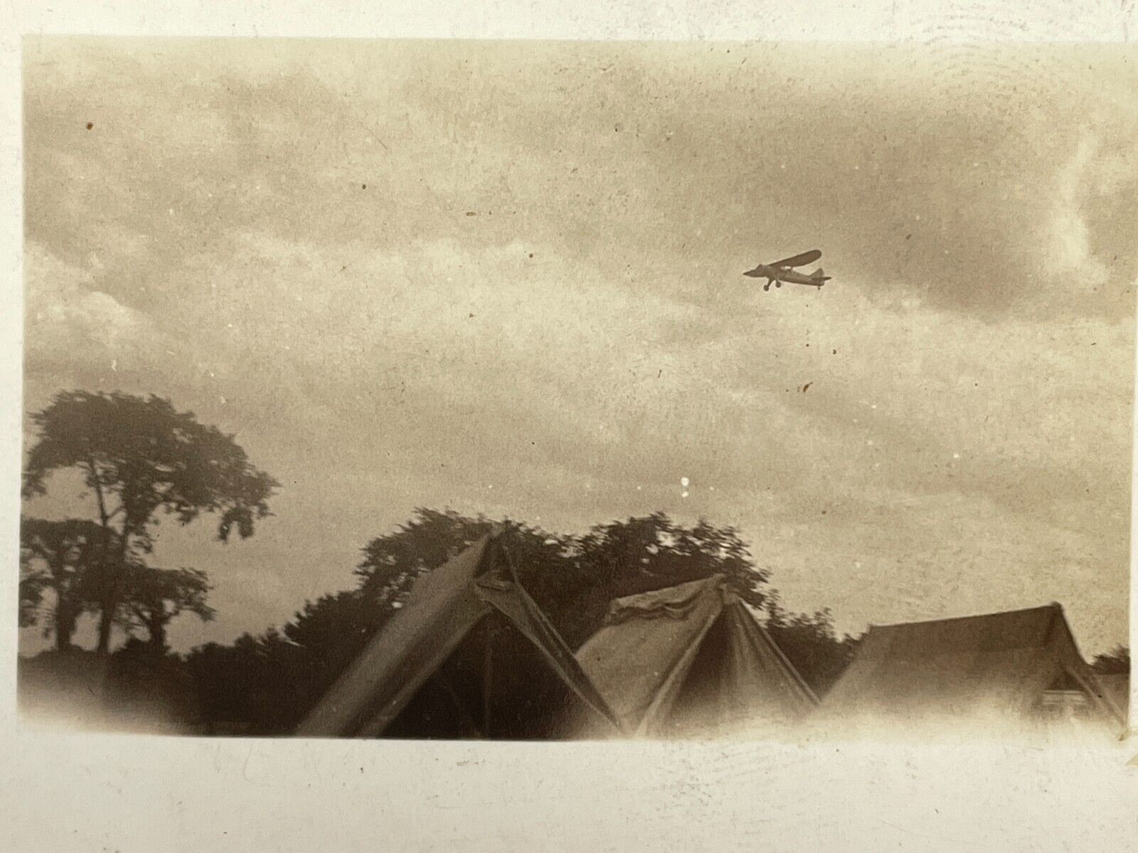 WH Photograph Plane Airplane Flying Over Tops Of Tents Artistic POV View 193-40s