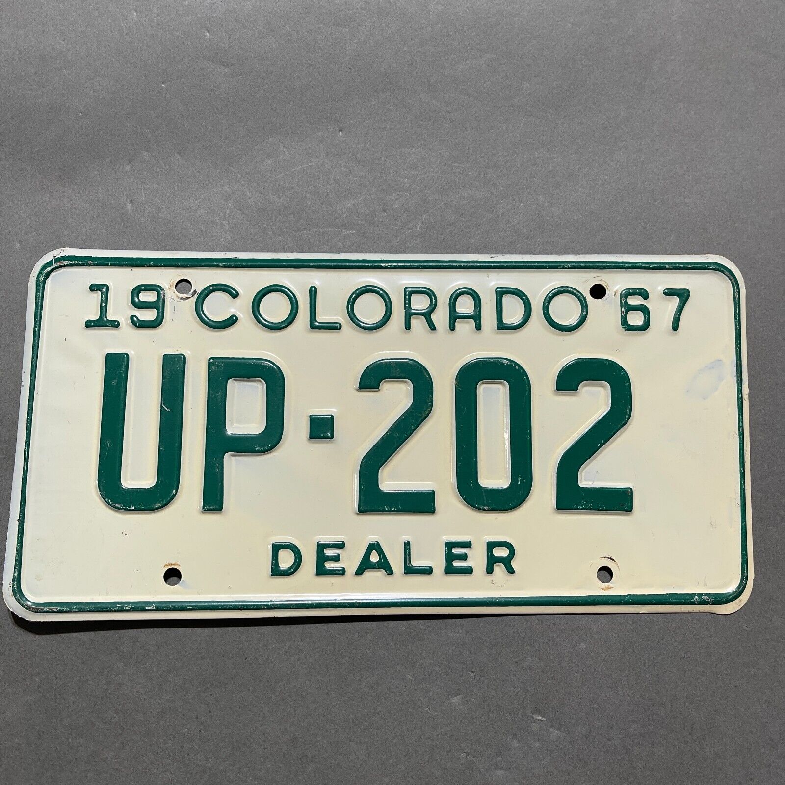 Colorado License Plate 1967 Dealer Tag Dealership Owner Auto Vehicle Repainted