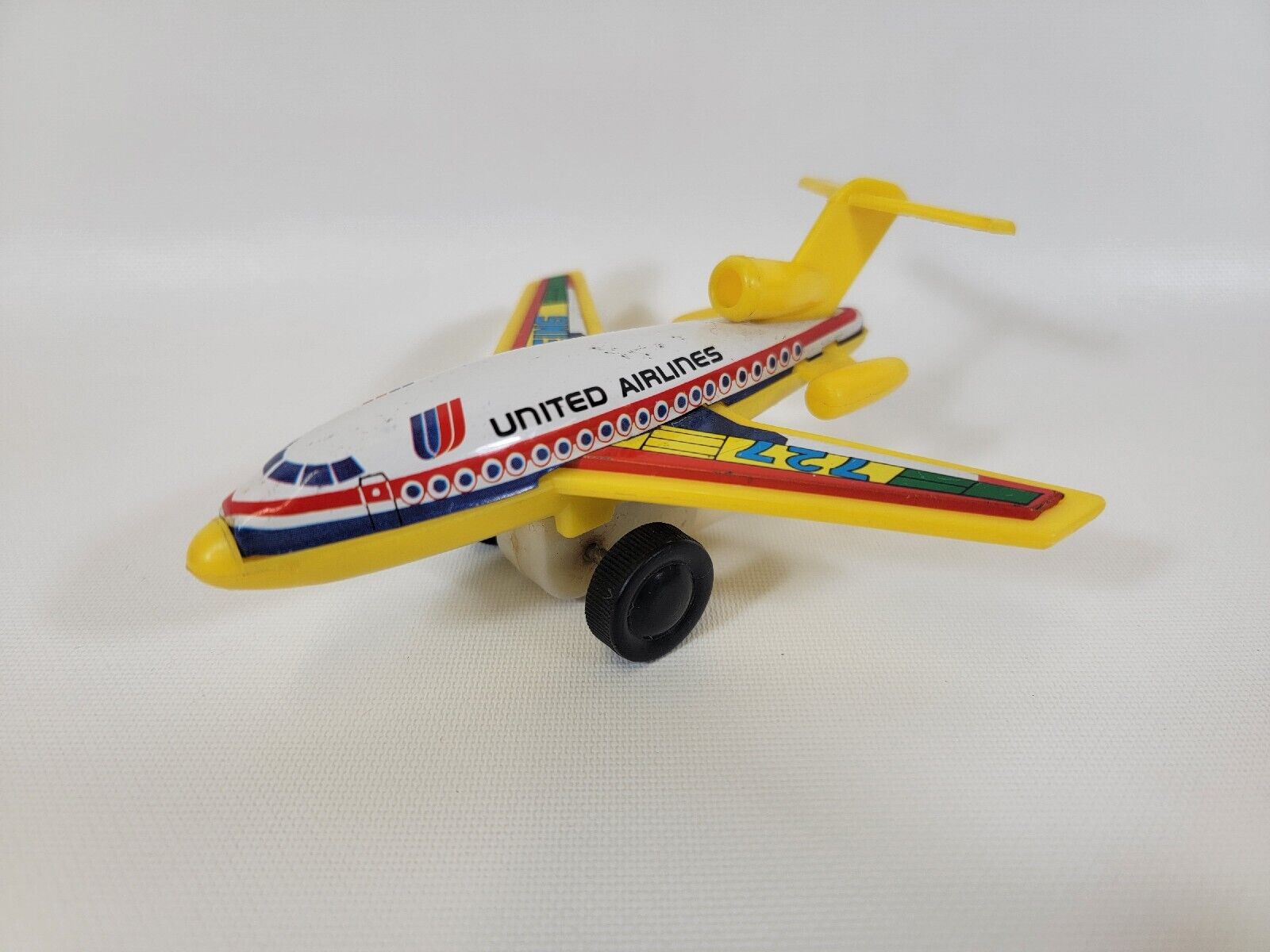 Vintage Jimmy Toys United Airlines Boeing 727 Plastic Tin Mechanical Airplane 5\