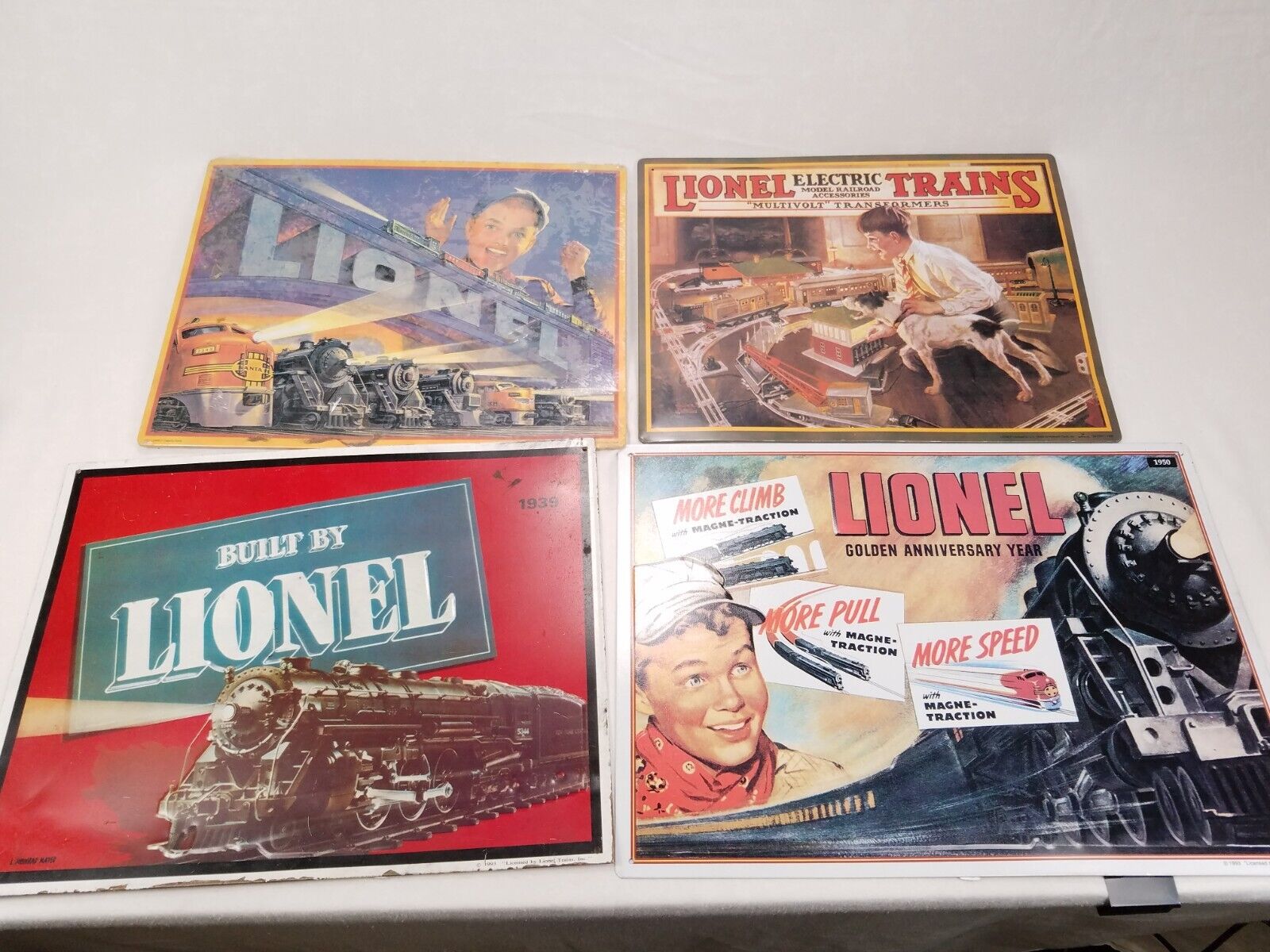 x4 Lot of Lionel Tin Signs, Built by Lionel, Golden Anniversary, 1930-1950s