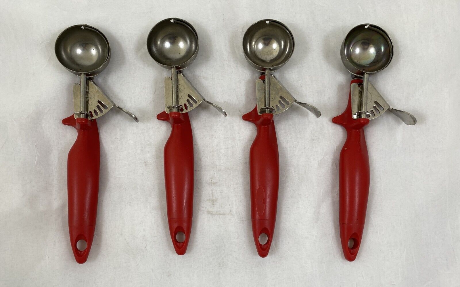 (4) QUALITE ICE CREAM SCOOPS WITH RED HANDLES NSF 9 1/4\