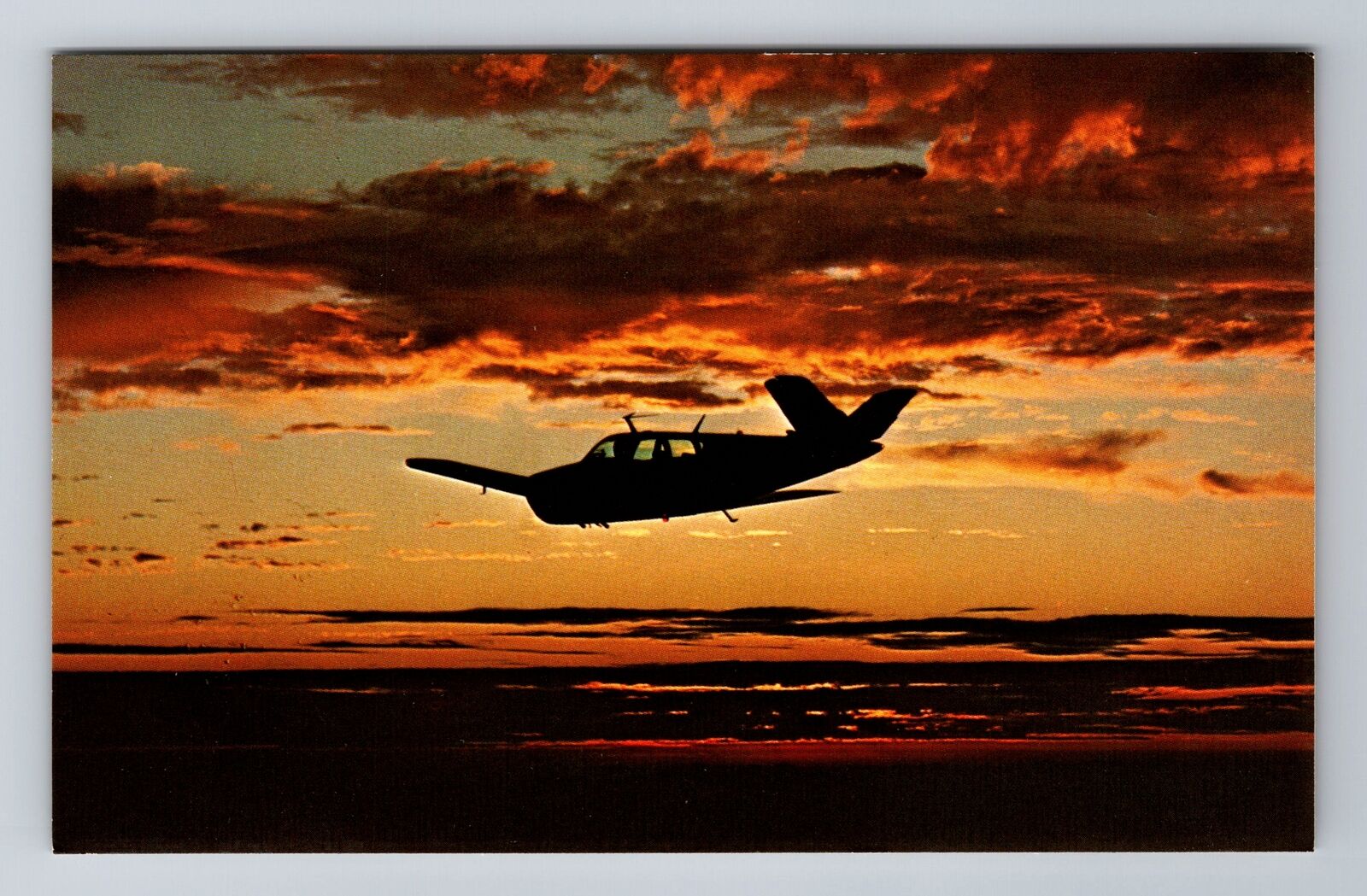 The Beechcraft Bonanza Aircraft Sunset Transportation, Antique, Vintage Postcard