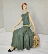 Vintage Seated 1920s Woman Statuette In Resin picture