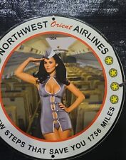 CLASSIC NORTHWEST ORIENT AIRLINES PINUP PORCELAIN ENAMEL SIGN. picture