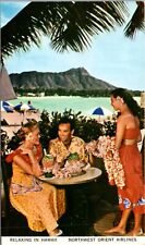 Postcard Northwest Orient Airlines Relaxing in Hawaii picture