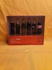 Collectible Coca Cola 2002 Evolution Of The Contour Bottle 6 Mini Glass Bottles picture