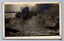 1909 RPPC GREAT FIRE NAMPA ID, 12 AVE, DEPOT, BANK, ROBB, ONLOOKERS Postcard PS picture