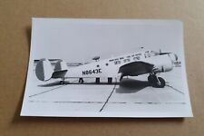 PLANE PHOTOGRAPH Beechcraft C-45H Expeditor N8643E ON RUNWAY 1970s picture