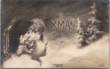1907 CHRISTMAS Photo RPPC Postcard Girl Looking at Trees A MERRY XMAS Rotograph picture