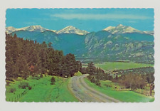 First View of Estes Park from Park Hill on Highway 66 Colorado Postcard Posted picture