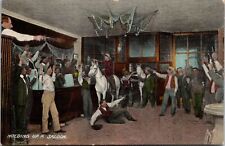 VINTAGE POSTCARD HOLDING UP A SALOON BAR ROOM GUNS PRINTED GERMANY 1909 picture