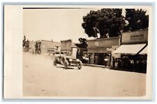c1910's Main Street Race Car Second Hand Store Car RPPC Photo Antique Postcard picture