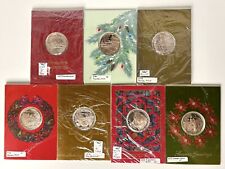 Franklin Mint Bronze Coin Christmas Holiday Cards Lot Of 7 1973-1980 Protected picture