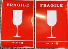 2x United Airlines ~FRAGILE~ Sticker Red 4.25” x 6.5” CGO Rev 7/12 Luggage Lot picture