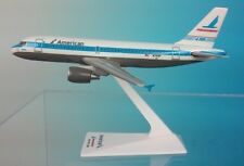 AMERICAN AIRLINES - PIEDMONT -  AIRBUS A319  DESK MODEL picture