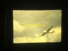 3G15 VINTAGE Photo 35mm Slide UNDERSIDE OF FIGHTER JET FROM GROUND CLOUDY SKIES picture