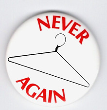 NEVER AGAIN  with a wire hanger. - 1989 graphic PRO-CHOICE support  button picture