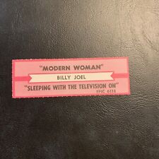 1 JUKEBOX TITLE Strip￼ Billy Joel Modern Woman/sleeping with tv on Columbia 45￼ picture
