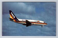 TACA Intl Air Boeing 737-210C, Transportation Antique Vintage Souvenir Postcard picture