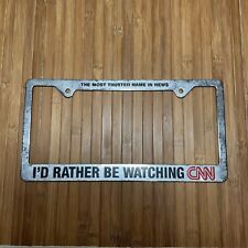 RARE VTG I’d Rather Be Watching CNN Metal License Plate Frame Cable News READ picture