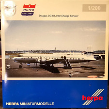 RARE and NEW 1:200 Herpa CONTINENTAL DC-6B N90961 HE556156 Gemini Jets NG scale picture