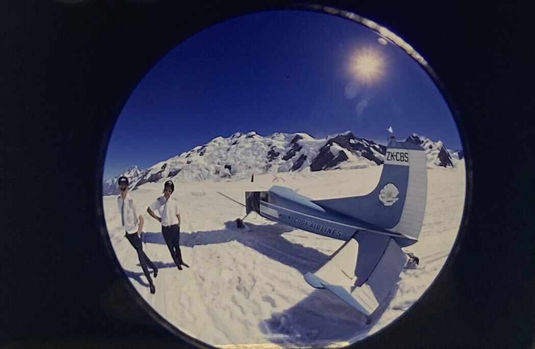 Vintage Photo Slide 1973 Pilots Plane Posed Fisheye Lens Snow Mountains