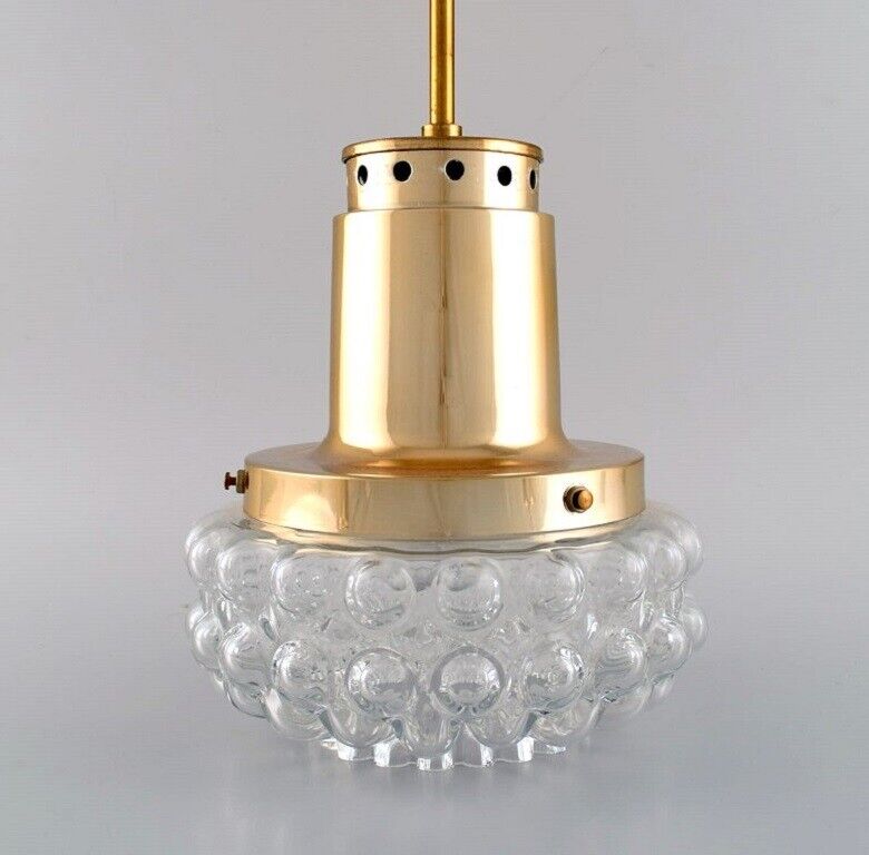 Helena Tynell for Limburg. Ceiling pendant in clear art glass and brass. 1970s.