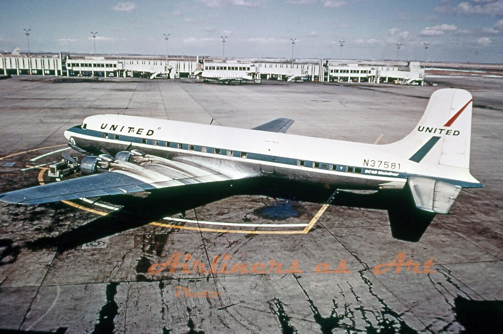 United Airlines Douglas DC-6B N37581 at DEN Early 1960s 8\