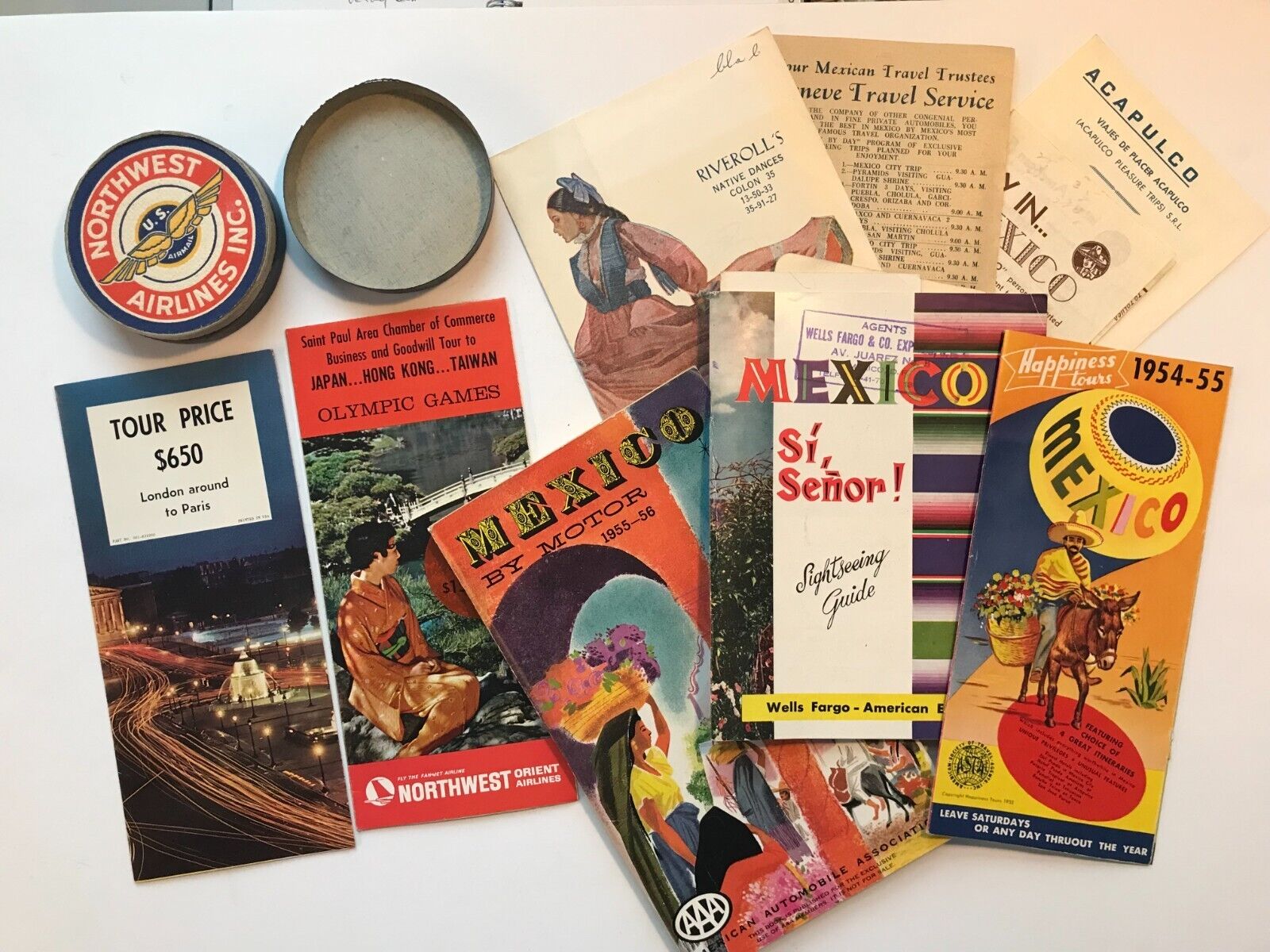 vintage Northwest Airlines coaster set and international travel brochures 
