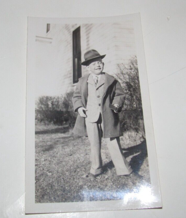 Vintage Black and White Photo of kid all dressed up
