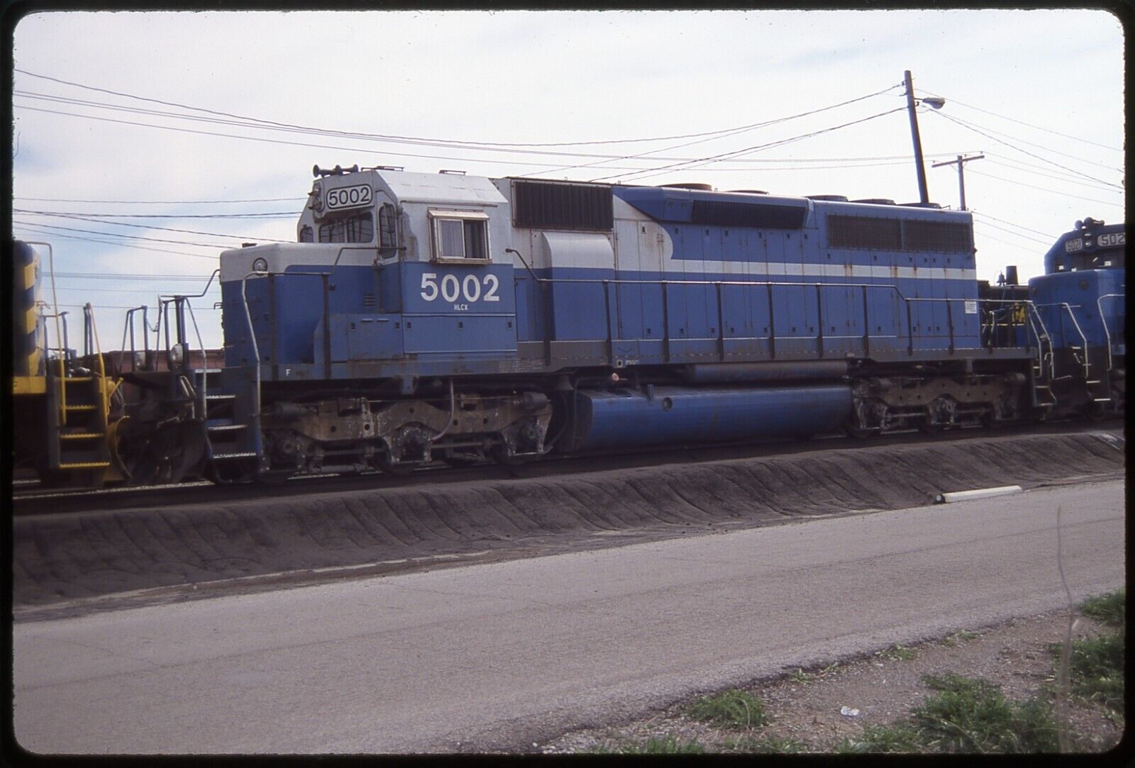Original Slide; HLCX ex-DE 5002 SD40 E. St. Louis, IL. 3-24-2000 Kodachrome